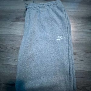 This is a Standard Fit Mid Rise Pants, Nike.